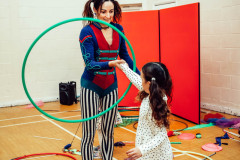 Teaching hula hoop